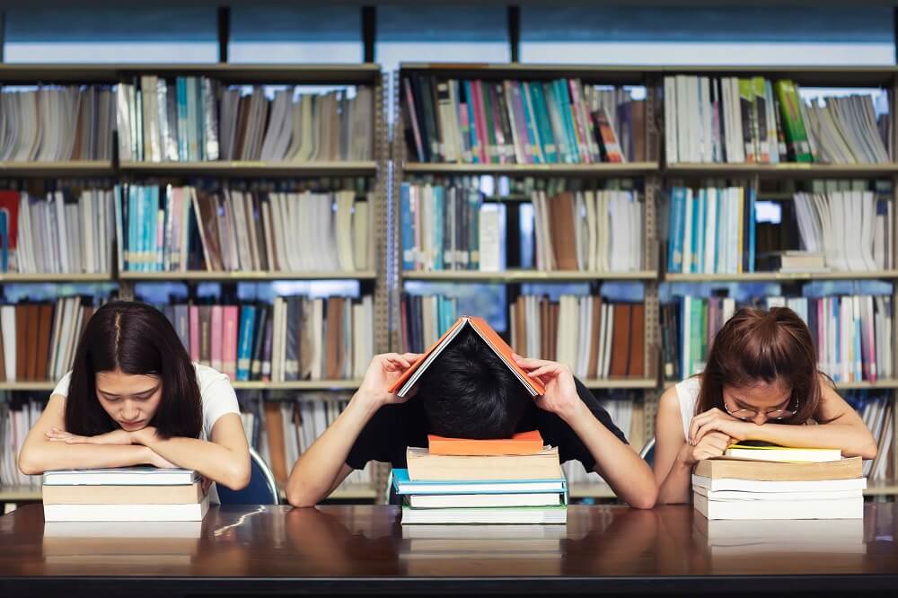students-stressed-in-library