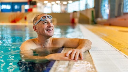 Smiling-Mature-Man-in-Swimming-Pool