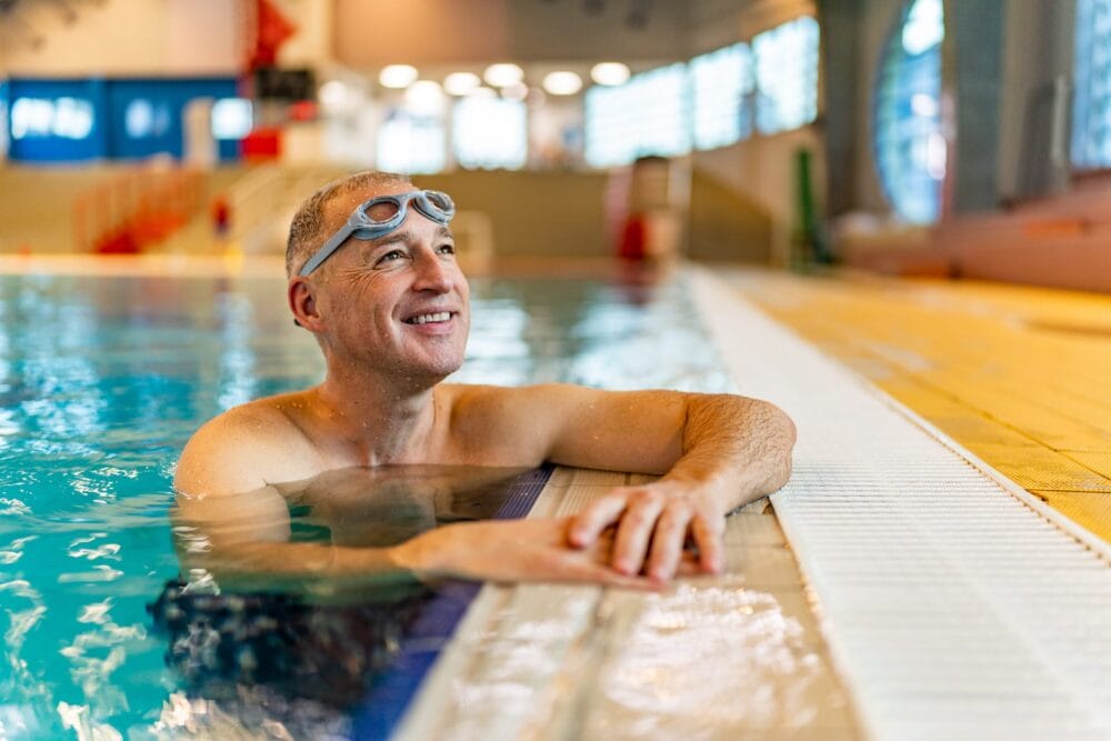 Smiling-Mature-Man-in-Swimming-Pool