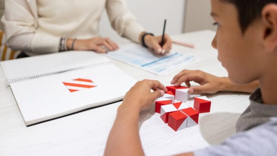 Argentinean-8-years-old-patient-boy-during therapy-consultation- being -evaluated-by-an-education-psychologist